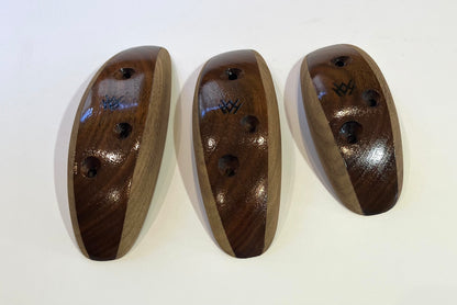 Varnished walnut pinches